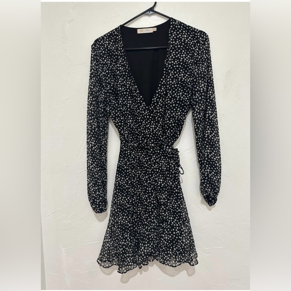 All in favor black and white wrap dress size large  large